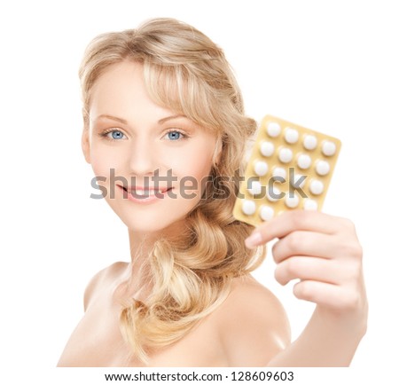 picture of young beautiful woman with pills .