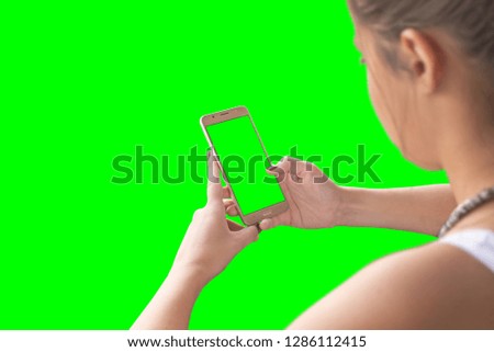 Girl use smart phone. Chroma key isolated.