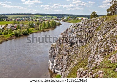 Massive coastal cliffs on the bank of the Chusovaya River, within the boundaries of the village of Sloboda. Sverdlovsk region. Russia