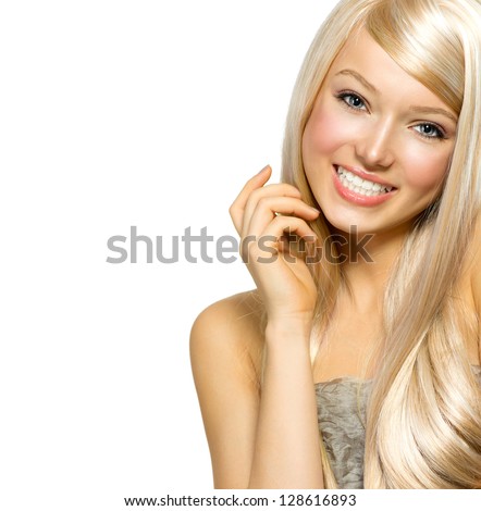 Beautiful Blond Girl isolated on a White Background. Blonde Long Hair. Beautiful Young Woman Portrait. Looking at Camera Royalty-Free Stock Photo #128616893