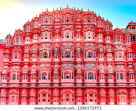 Hawa Mahal is one of the most popular attractions in the Pink City of Jaipur. Built  in 1799, using pink and red sandstone, Hawa Mahal is a fine specimen of Rajput architecture. Royalty-Free Stock Photo #1286172973