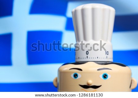 Fast food symbol. Kitchen clock. Greek chef icon waving Greek flag in background. Food delivery. Restaurant serving Gyros and other Greek specialties - Icon. Kitchen Traditional Greek food - Image