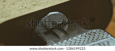 Macro image of key stuck in lock, open lock with key in hole. Royalty high-quality free stock close up photo image of key in lock rusty