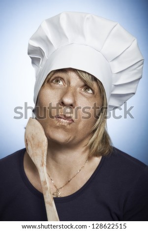 cook woman looking up with thinking expression