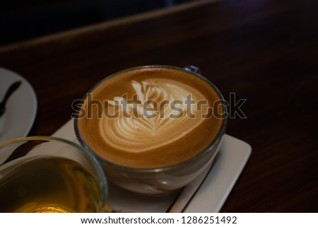 
Hot latte served with hot tea