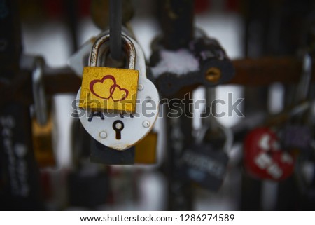 locks in the form of hearts. bright colorful metallic love symbols