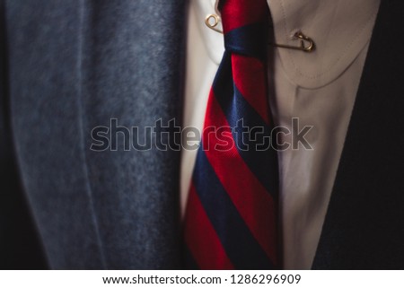 Blue Suit and Red Tie