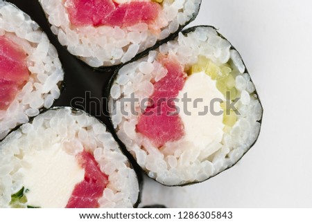 Traditional japanese sushi rolls on white background