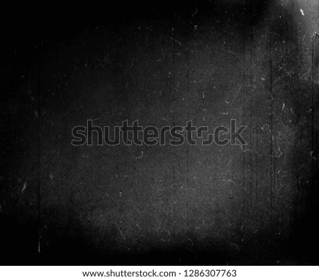Grunge film negative background, black scratched texture, old film effect