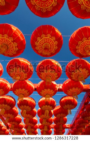 Hang red lanterns for the New Year