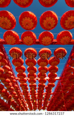 Hang red lanterns for the New Year