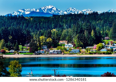Poulsbo Bainbridge Island Puget Sound Snow Mountains Olympic National Park, Washington State Royalty-Free Stock Photo #1286340181