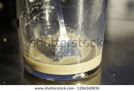 Cafe with milk in bar, drink and breakfast