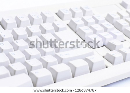 Retro computer keyboard on white background, home button-enter