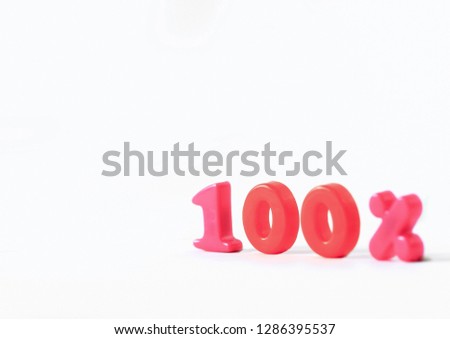 one hundred percent large letters on a white background