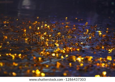 
gold tinsel on the floor