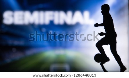 SEMIFINAL Tittle and Silhouette of Soccer player. Football photo, Edit space