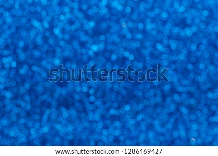 Defocused Natural Glitter Lights Bokeh. Abstract Pattern Blue Sea Navy Texture Background