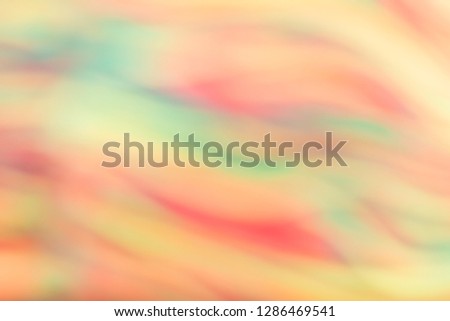 Blurred Defocused Natural and Colorful Bokeh. Abstract Striped Pattern Yellow, Red and Green Texture Background