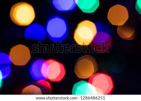 An abstract backdrop created by taking a deliberately out of focus image of Christmas lights