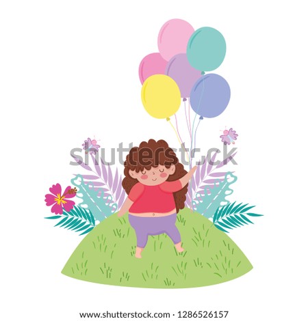 Little chubby girl with balloons air in the landscape