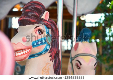 Close-up pictures of beautiful colored carousel Located in the field in the temple
