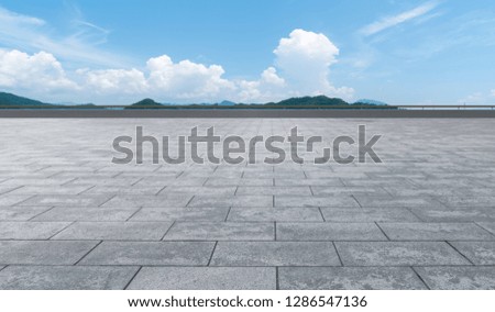 Empty floor tiles and outdoor natural landscape

