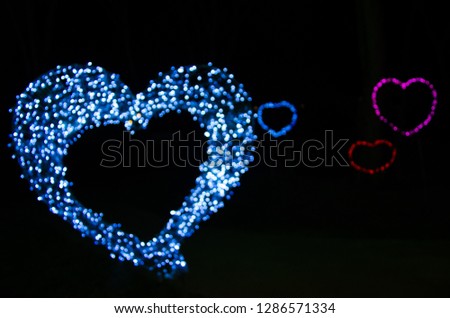 Hearts abstract blurred bokeh background for love Valentine's day.Decorate the lights to celebrate for lover.