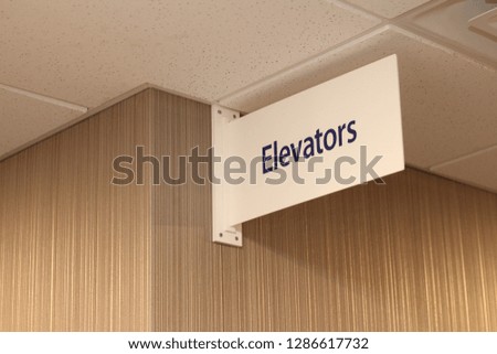 Elevators sign in hotel lobby