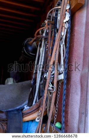 Ropes and alters for horses stored away inside.