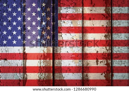 United States flag on a grunge plank wood texture for decoration or design