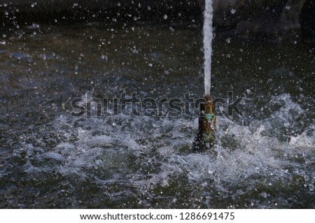 Splashing water from the fountain