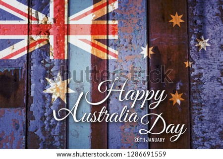 Happy Australia Day concept - Australian flag on a plank wood texture