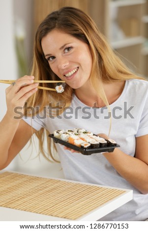 woman eating japanese food