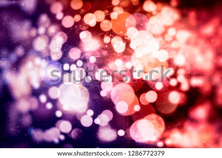 Abstract light celebration background with defocused golden lights for Christmas, New Year, Holiday, party