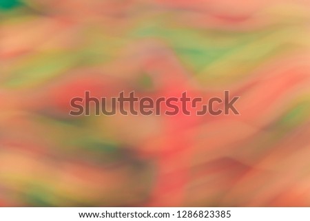 Blurred Defocused Natural and Colorful Bokeh. Abstract Striped Pattern Yellow, Red and Green Texture Background