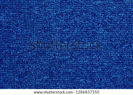 Dark blue carpet seamless texture background with high resolution, fabric cloth pattern for design art work.