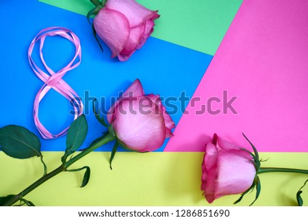 Blank card with pink rose on geometric background. Copy space March 8th International Women's Day