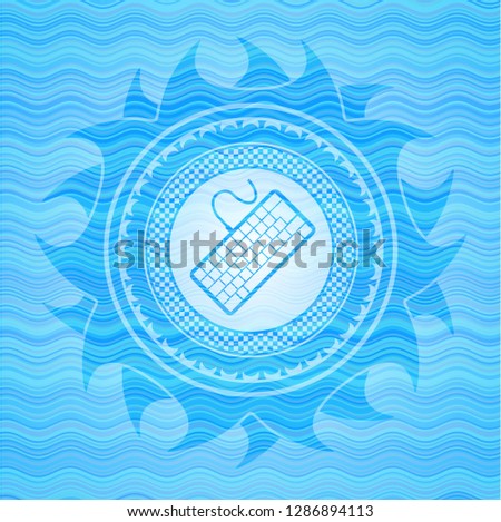 keyboard icon inside water concept emblem background.