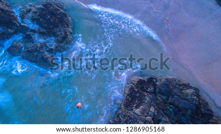 Aerial photography of a beach with rocks