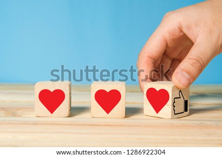 hand flipping like symbol turning to love, making customer impressive experience concept Royalty-Free Stock Photo #1286922304