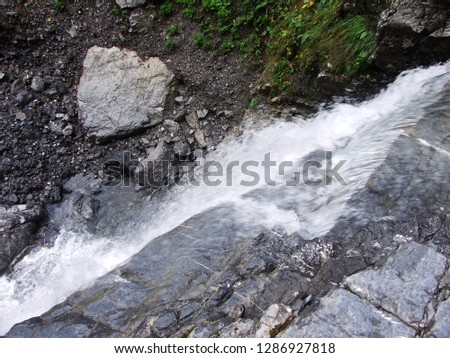 Seasonal waterfalls in the Valley of Lake Klöntalersee (Klontalersee or Kloentalersee) - Canton of Glarus, Switzerland