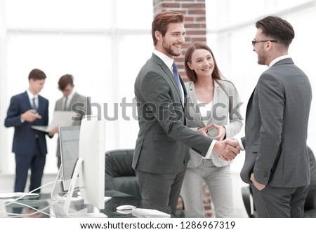handshake business partners at a meeting Royalty-Free Stock Photo #1286967319