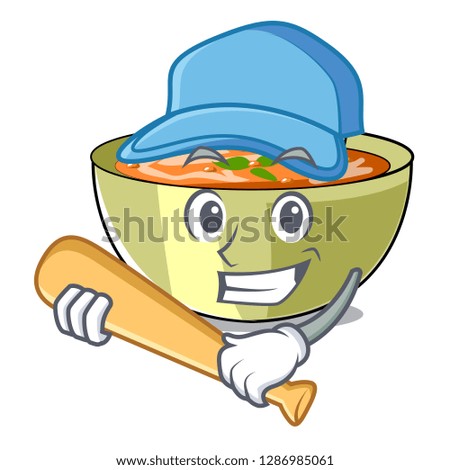 Playing baseball lentil soup in a mascot bowl