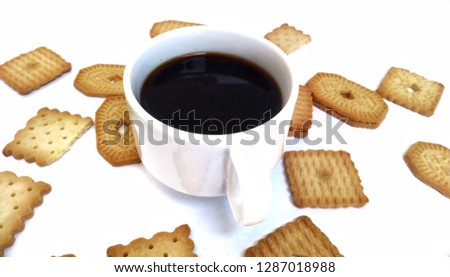 Coffee in white glass and cookies  white background.