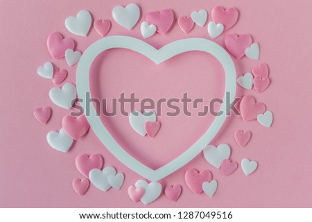 Valentines day concept. Greeting card with a pink and white hearts and space for text. Top view. Flat lay. 