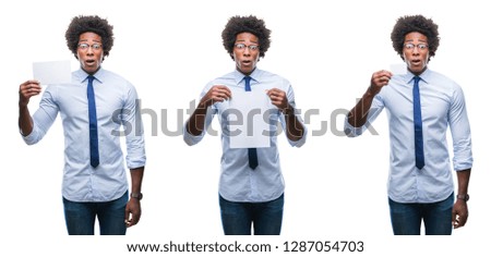 Collage of african american young business man holding blank paper card over isolated background scared in shock with a surprise face, afraid and excited with fear expression