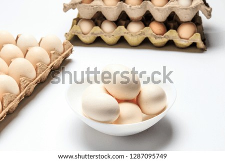 Take close-up pictures of different kinds of eggs