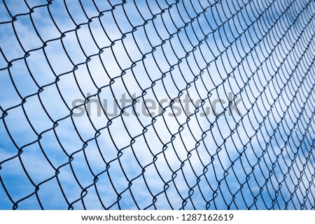Grid mesh steel on blue sky on daytime