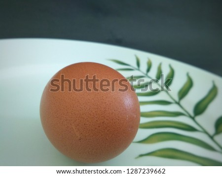 egg plate with dark background 